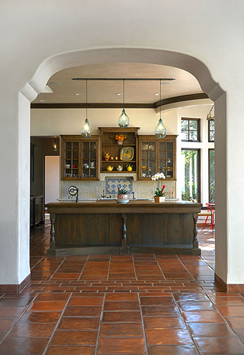 Spanish kitchen with glass pendant lighting